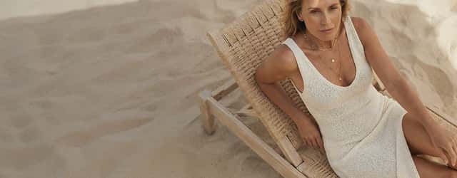 Woman seated in beachside light, before and after gallery invitation
