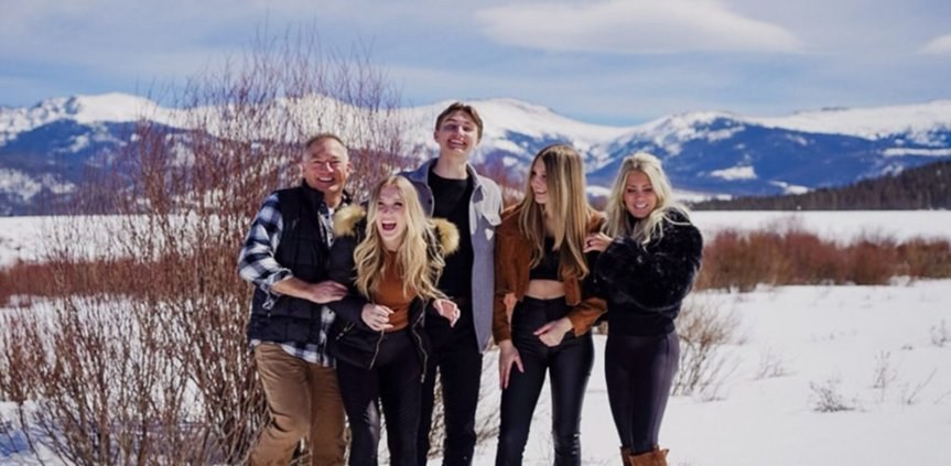 Dr. Hasen with his wife and three children on a winter trip in the mountains