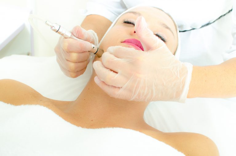 Woman undergoing nonsurgical facial treatment