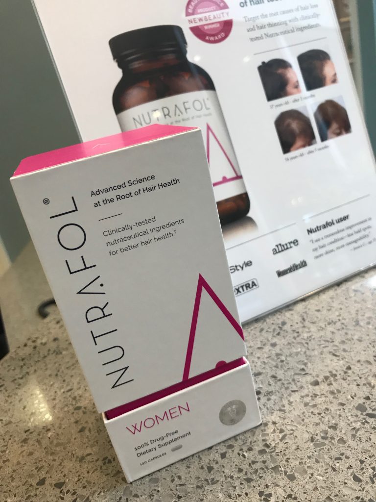 Nutrafol packaging for women