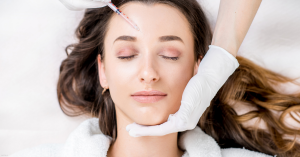 A woman gets dermal filler treatment in Naples, FL.