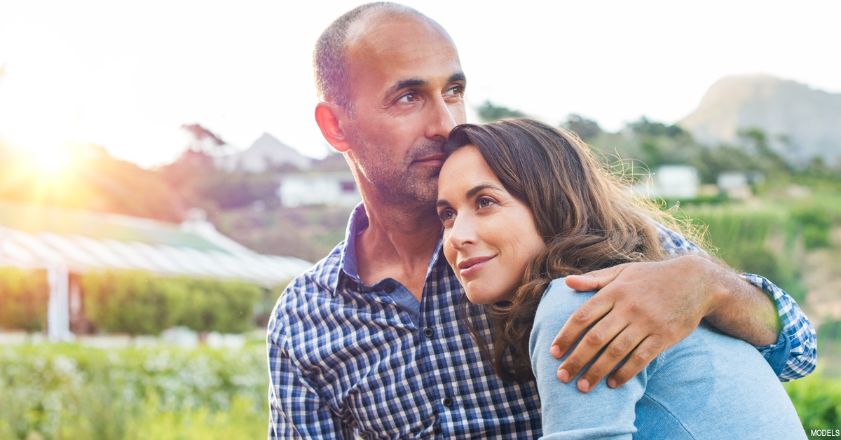 Youthful-looking middle aged couple