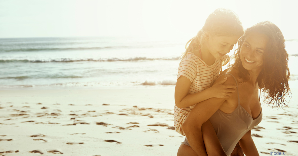 mom and daughter at the beach (models)