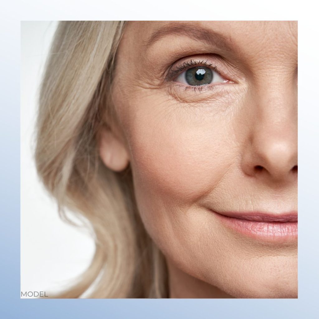 A close-up of an older woman's face (model)
